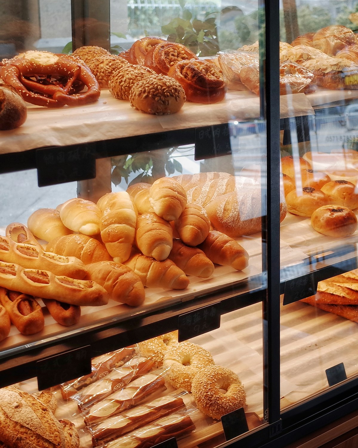 A market stall of bread and pastries with Edinburgh stone buildings behind